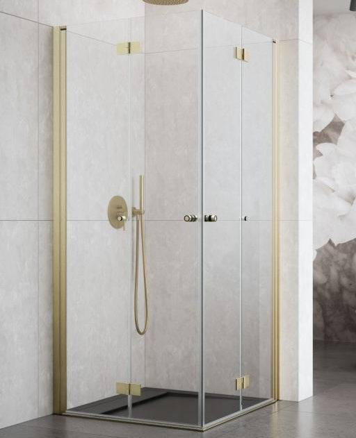 Кабина със сгъваеми врати KAX-8G Brushed Gold 80х80 см. Вариант с прозрачни стъкла и златни детайли.